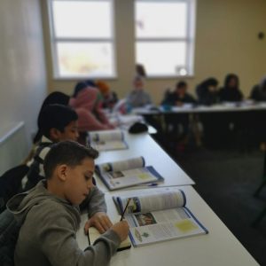 Students working hard in an Islamic Studies class