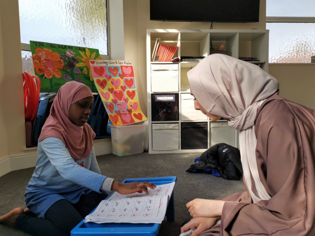 A student practising Arabic with one of our teachers.